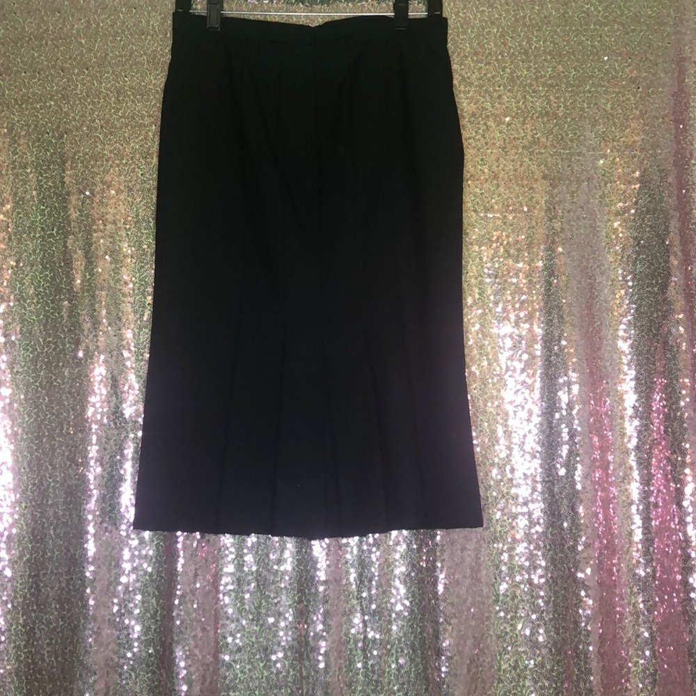 Long pleated black skirt